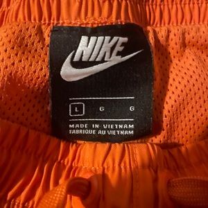 Vibrant orange Nike shorts